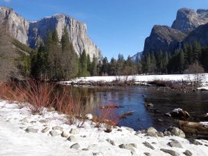 water mountains and snow at Yosemite National Park